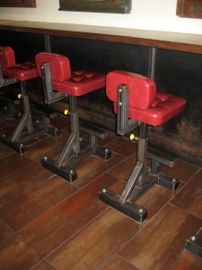 How cool are those chairs? They have height adjusters just like gym weight machines!